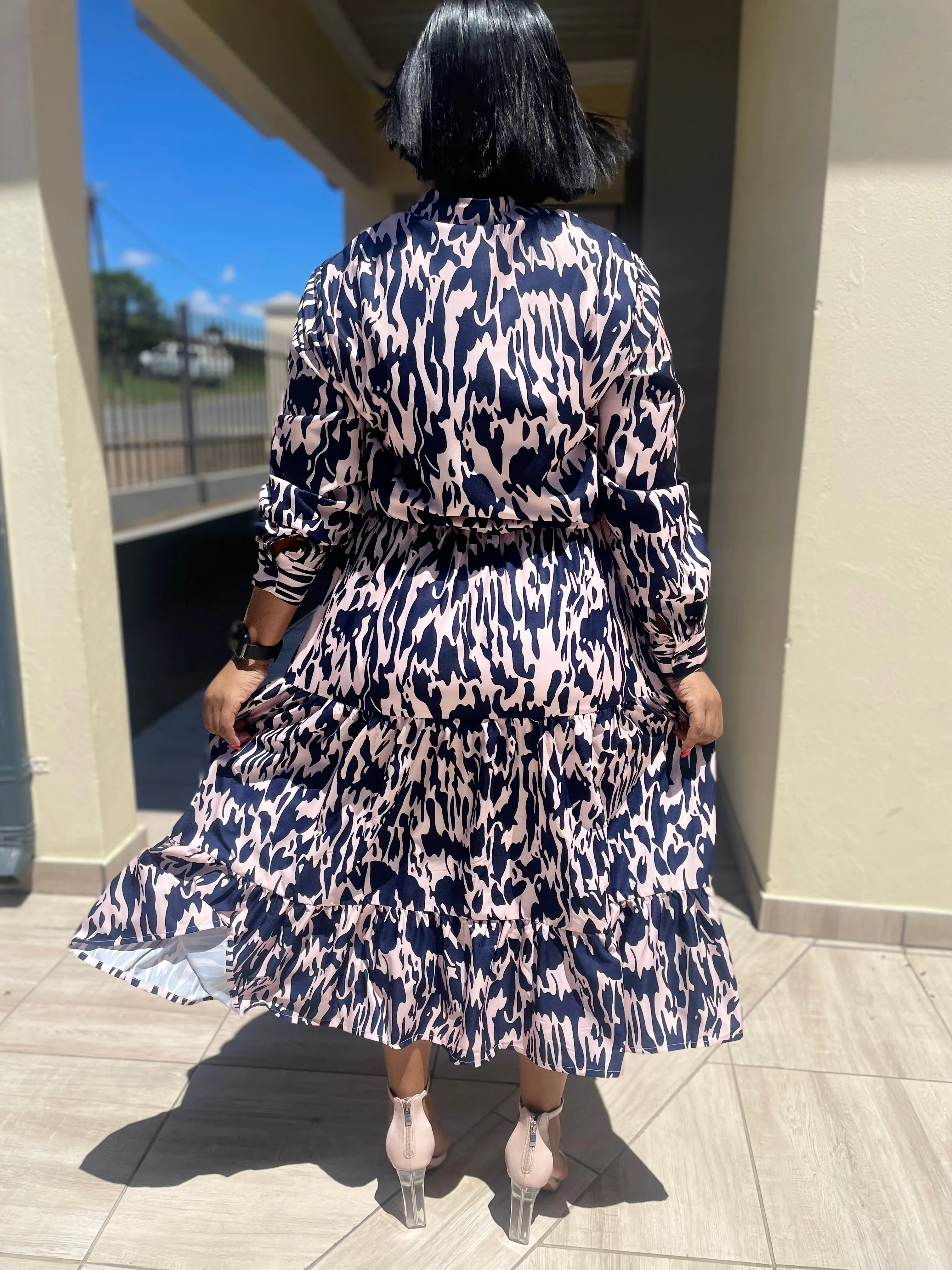 La Moda 2pc Set Mid Skirt Long  Sleeve Top with Button suitable for all occasions Price: R300 Size: L-5XL
