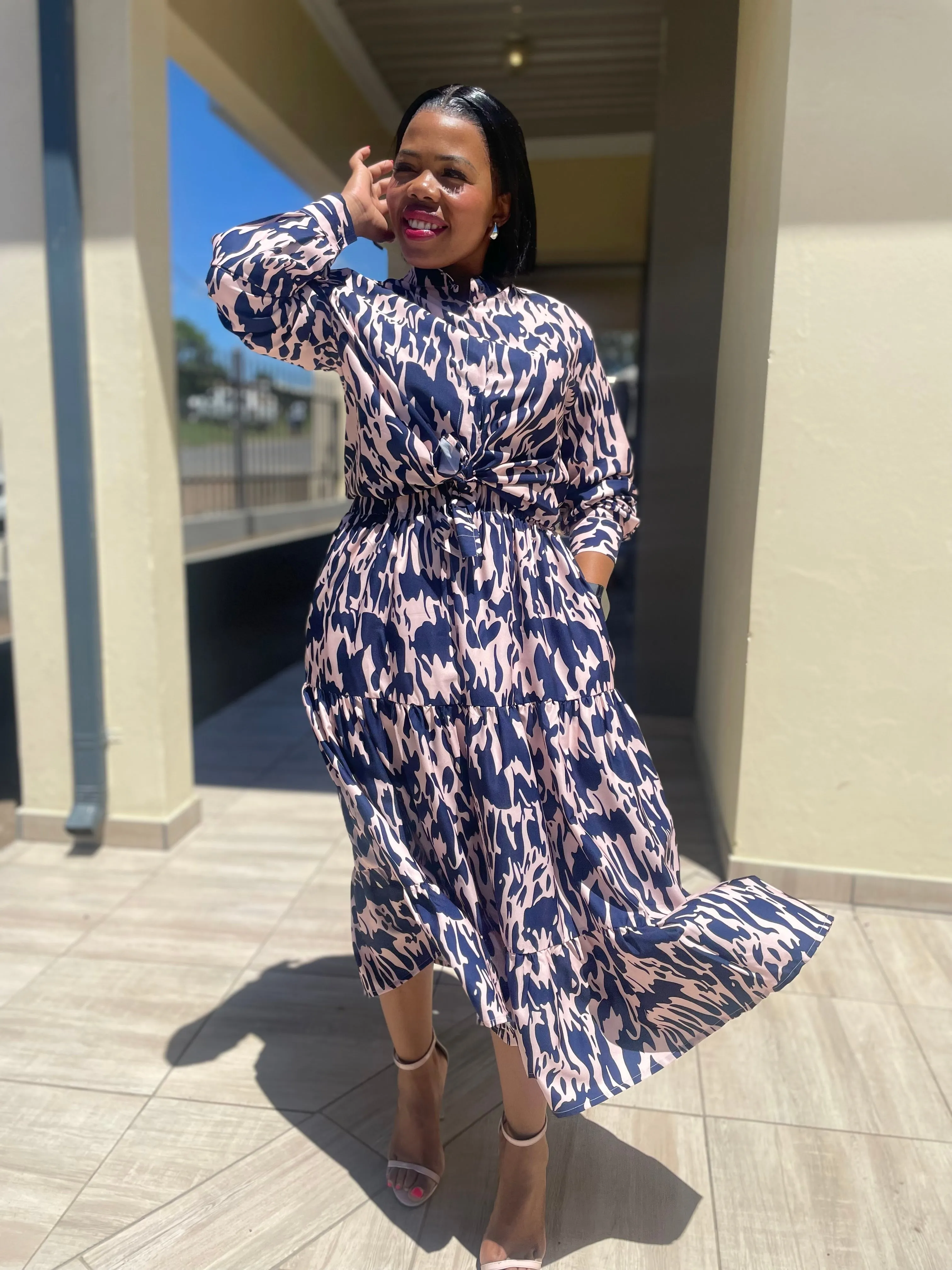 La Moda 2pc Set Mid Skirt Long  Sleeve Top with Button suitable for all occasions Price: R300 Size: L-5XL