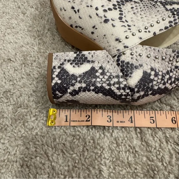 Steve Madden “Rockstar” black and white snake print heeled booties