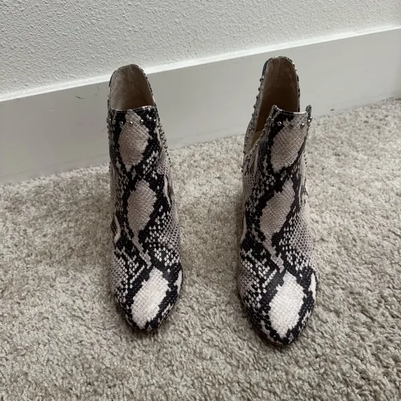 Steve Madden “Rockstar” black and white snake print heeled booties