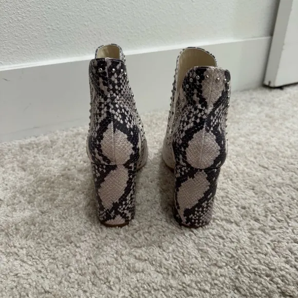Steve Madden “Rockstar” black and white snake print heeled booties